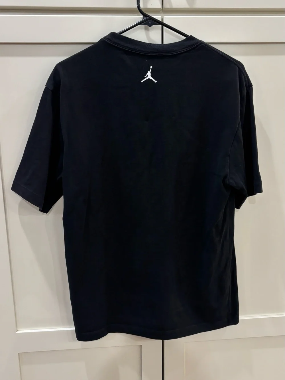 Jordan Black Short Sleeve Tee with Ringed Hands Graphic